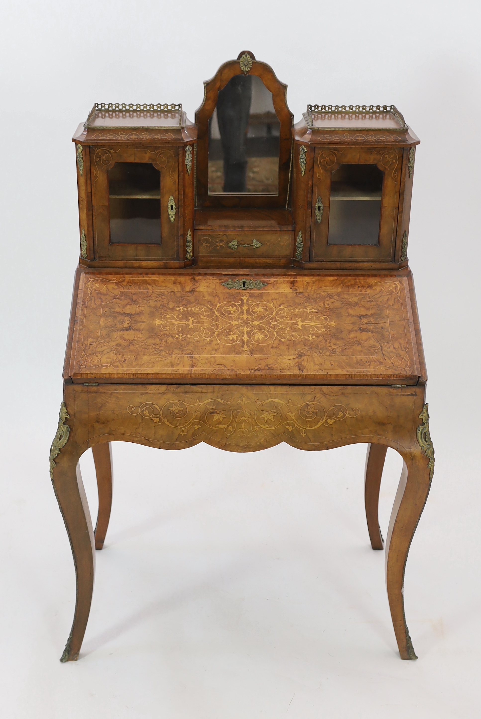 A Victorian marquetry inlaid walnut bonheur du jour, width 88cm, depth 53cm, height 140cm